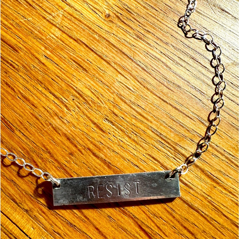 RESIST hand stamped necklace